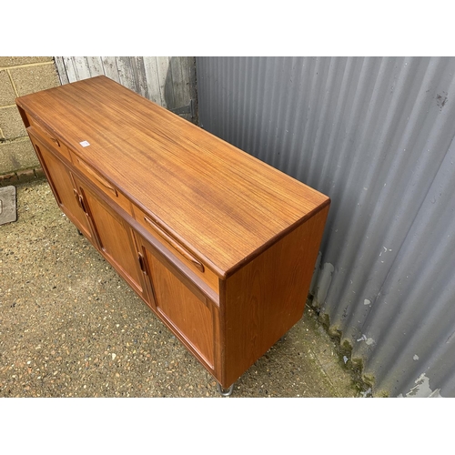 177 - A g plan fresco style teak  sideboard raised on hairpin legs 144x40x85