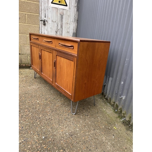 177 - A g plan fresco style teak  sideboard raised on hairpin legs 144x40x85