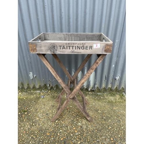 2 - A Tattinger champagne tray on folding stand