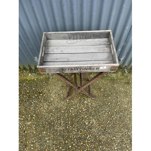 2 - A Tattinger champagne tray on folding stand