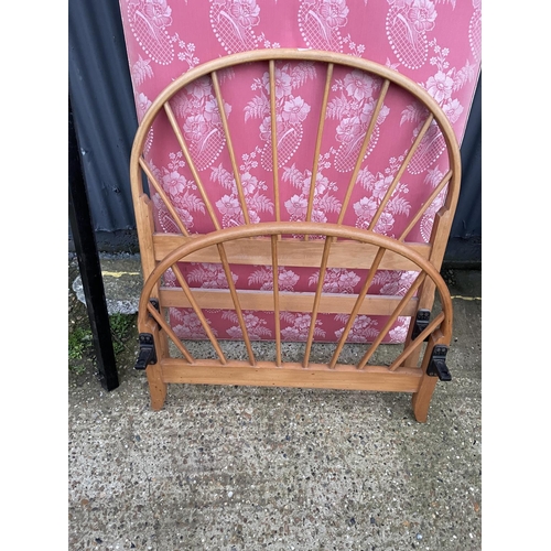 209 - A pair of early ercol light elm single bed frames with drop in divan bases