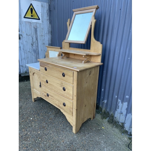 216 - A country pine washstand / dressing chest with swimg mirror and marble top 120x45x154