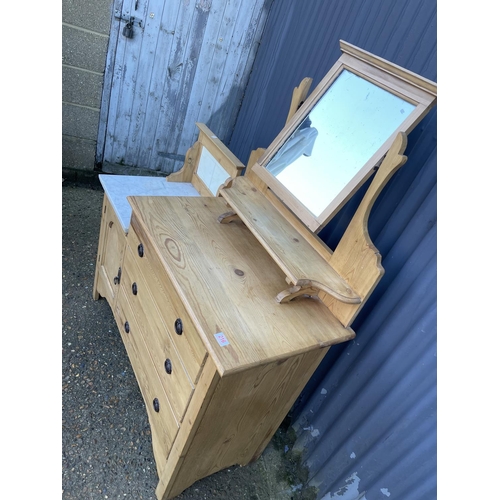 216 - A country pine washstand / dressing chest with swimg mirror and marble top 120x45x154