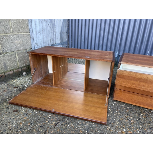 231 - Two tapley teak wall units, one chest of three the other a bureau