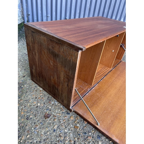 231 - Two tapley teak wall units, one chest of three the other a bureau