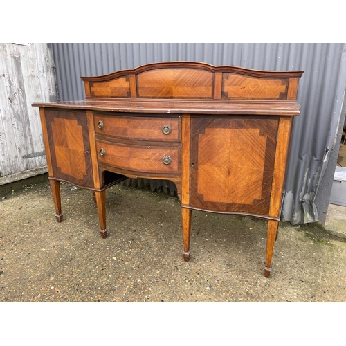 233 - An Edwardian mahogany bow front sideboard 168x 54x 92