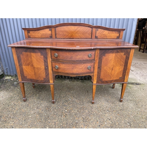 233 - An Edwardian mahogany bow front sideboard 168x 54x 92