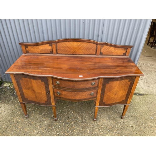 233 - An Edwardian mahogany bow front sideboard 168x 54x 92