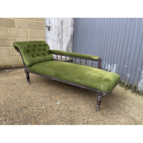 235 - An Edwardian green upholstered chaise lounge 170cm