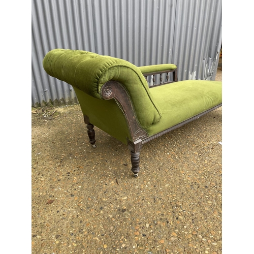 235 - An Edwardian green upholstered chaise lounge 170cm