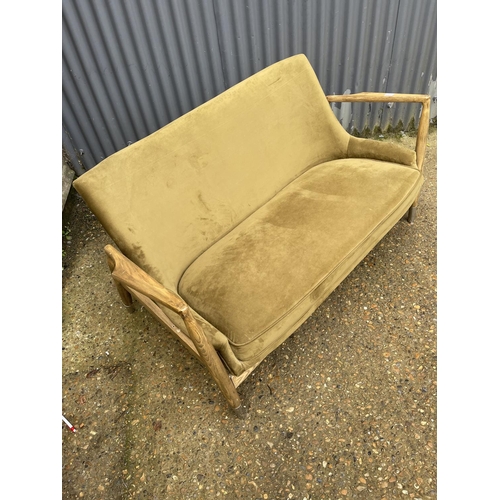 237 - A modern green upholstered two seater love seat 150cm wide