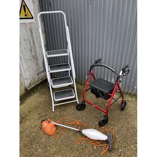 24 - A set of folding steps, vax cleaner and a mobility walker