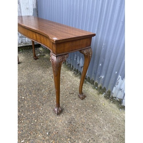 241 - A long mahogany side / serving table on ball and claw feet 153x 45 x86