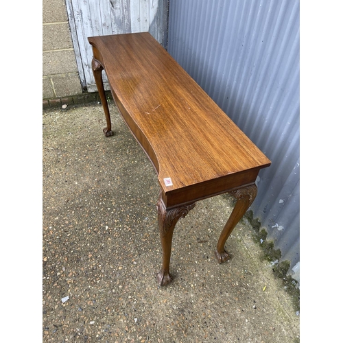 241 - A long mahogany side / serving table on ball and claw feet 153x 45 x86