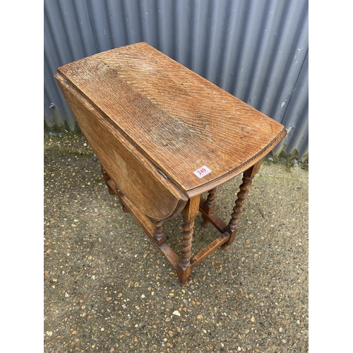 249 - An oak gate-leg table