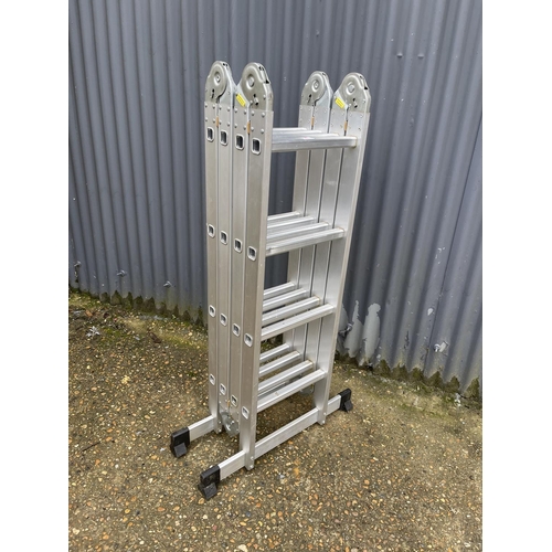 26 - An aluminium four section folding ladder