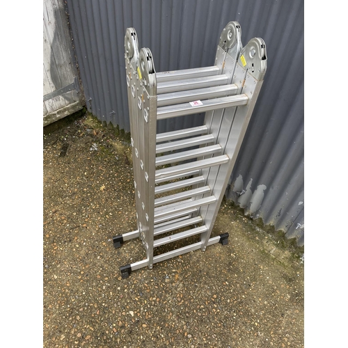 26 - An aluminium four section folding ladder