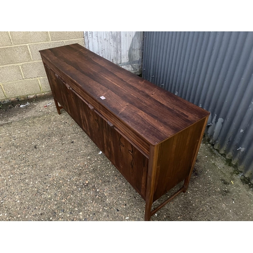 265 - A mid 20th century century rosewood cocktail sideboard