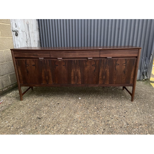 265 - A mid 20th century century rosewood cocktail sideboard