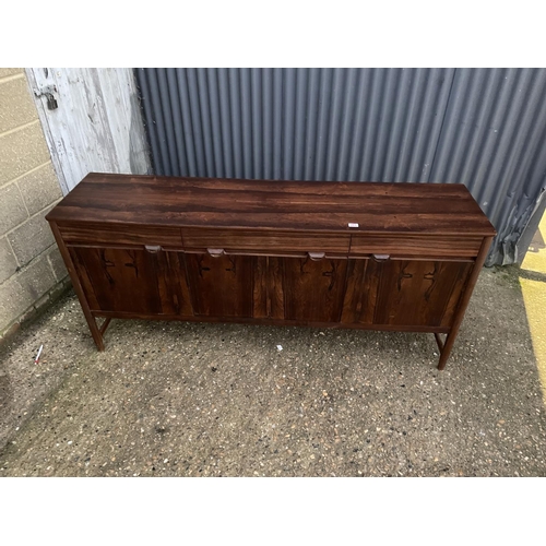 265 - A mid 20th century century rosewood cocktail sideboard