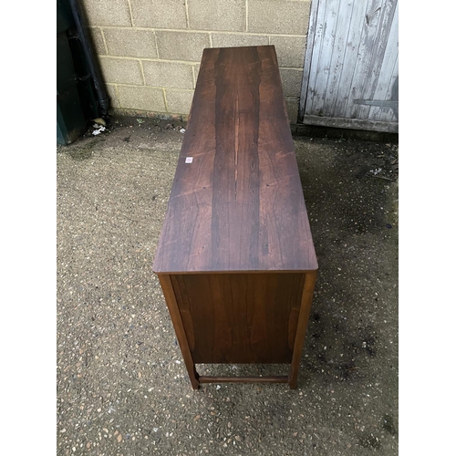 265 - A mid 20th century century rosewood cocktail sideboard