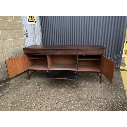 265 - A mid 20th century century rosewood cocktail sideboard