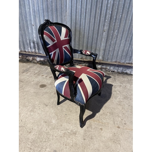 324 - A Union Jack pattered throne style armchair