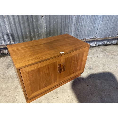 325 - A small g plan teak two door sideboard base unit