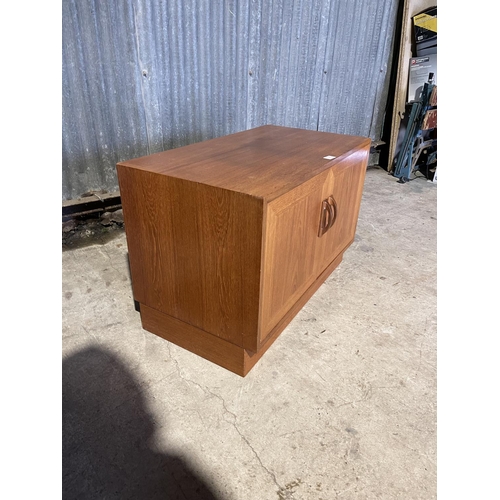 325 - A small g plan teak two door sideboard base unit