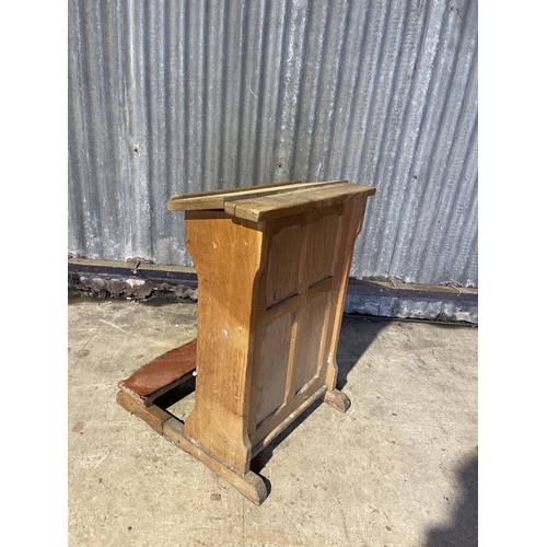 327 - A vintage oak chapel confessional kneeler, with rose and fall mesh screen