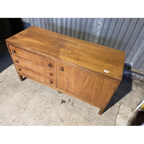 329 - A small mid century teak combination chest 120 x46x65