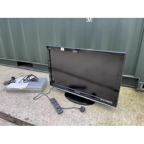 335 - A Panasonic tv together with Phillips dvd/ video player