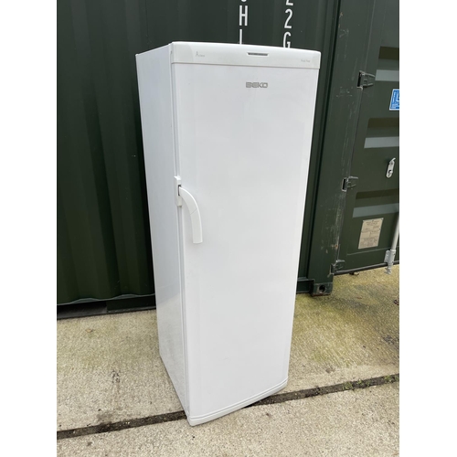 338 - A beko upright larder freezer