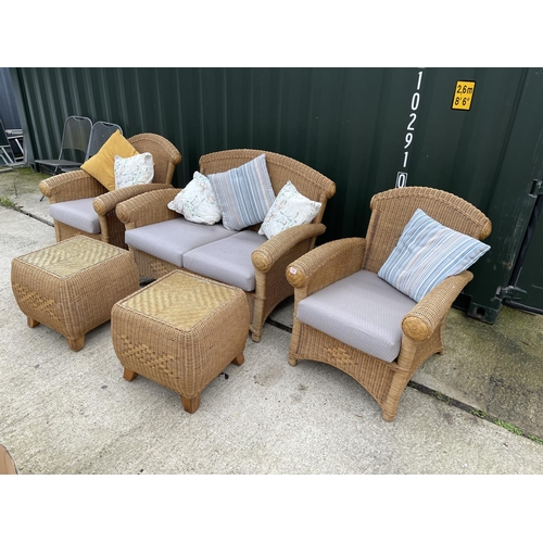 339 - A MODERN wicker five piece conservatory suite by RATANCRAFT consisting of a sofa, two chairs and two... 