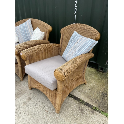 339 - A MODERN wicker five piece conservatory suite by RATANCRAFT consisting of a sofa, two chairs and two... 