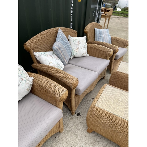 339 - A MODERN wicker five piece conservatory suite by RATANCRAFT consisting of a sofa, two chairs and two... 