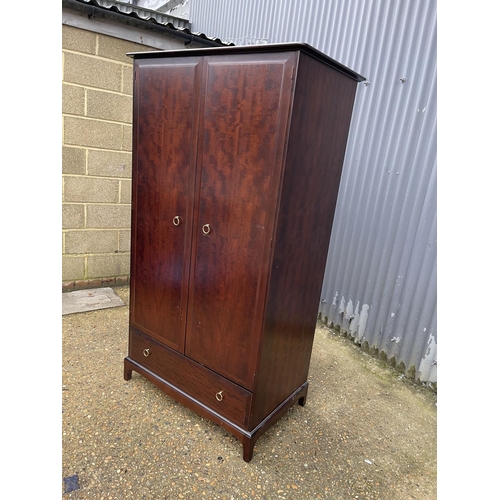 34 - A stag minstrel double wardrobe with single drawer 80x57x178