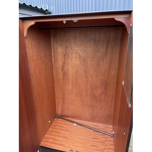 34 - A stag minstrel double wardrobe with single drawer 80x57x178