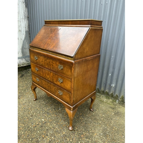 37 - A walnut bureau 70cm wide