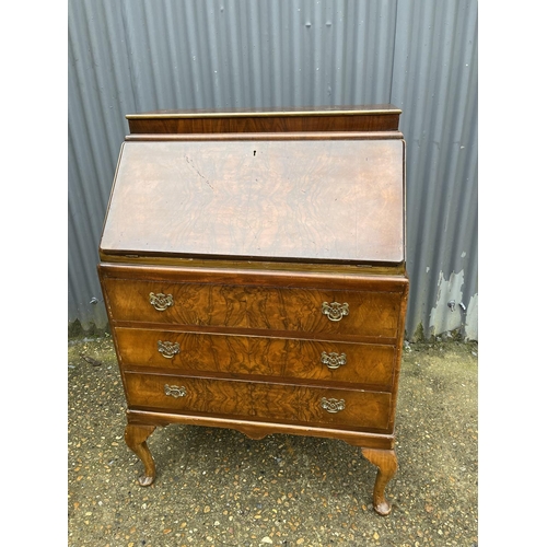 37 - A walnut bureau 70cm wide