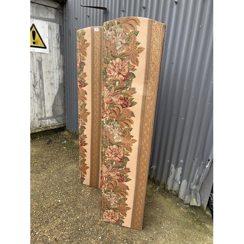 39 - A four section screen, floral upholstered to the front and pink to the reverse 167cm high