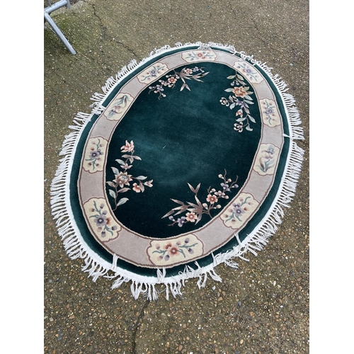 45 - An oval Chinese pattern rug