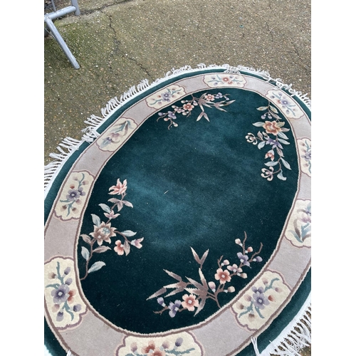 45 - An oval Chinese pattern rug