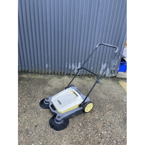 52 - A Karcher yard sweeper