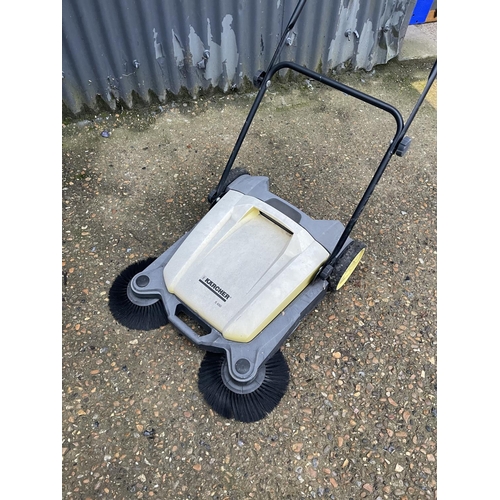 52 - A Karcher yard sweeper