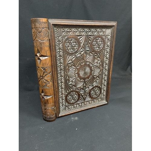 527 - Carved wooden box in the form of a book, size 56 x 44 x 10cms