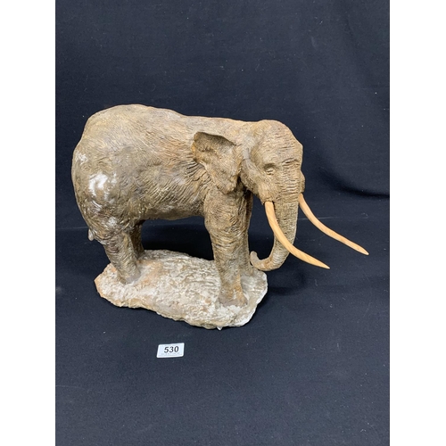 530 - Pottery study of and Indian Elephant, height 34cms, slight damage to 1 ear