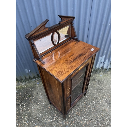 56 - An Edwardian inlaid mahogany music cabinet