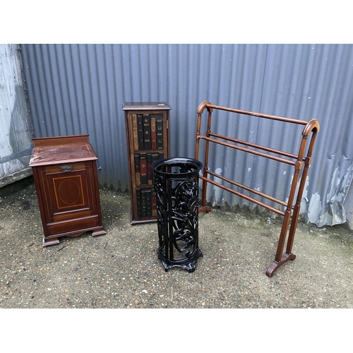 58 - A metal umbrella stand together with an airer, a book effect cupboard and an inlaid coal box