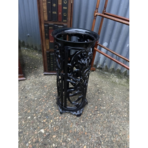 58 - A metal umbrella stand together with an airer, a book effect cupboard and an inlaid coal box